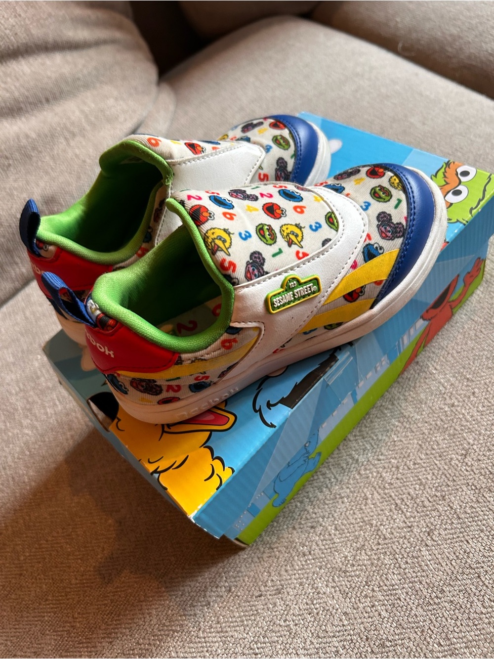 Reebok Kids White Sneakers with Blue, Red, Yellow & Green Accents